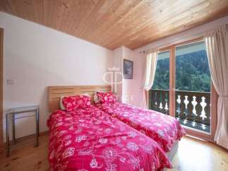 Discover a cozy bedroom with a stunning view.