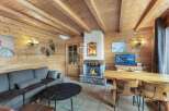 Experience the warmth of this charming chalet, featuring stunning wooden interiors and a cozy fireplace.