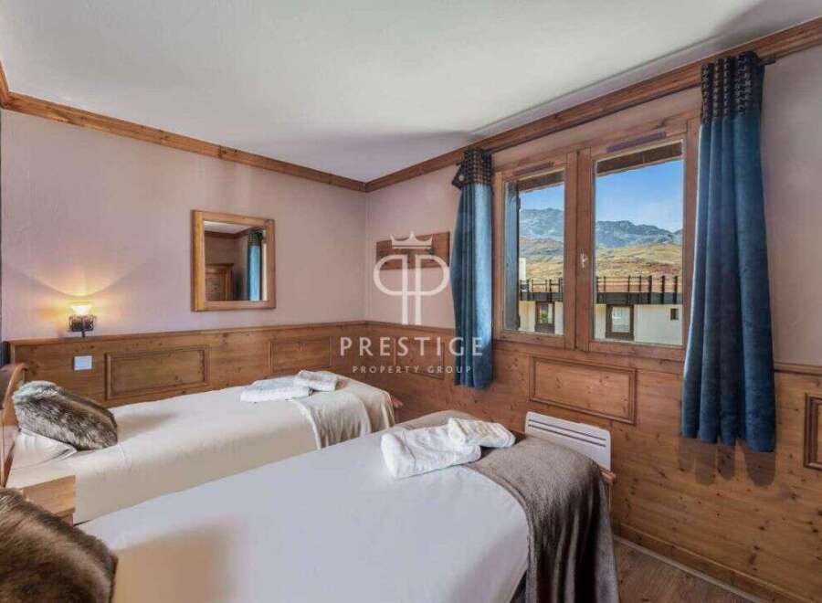 Discover a cozy bedroom with a touch of rustic charm.