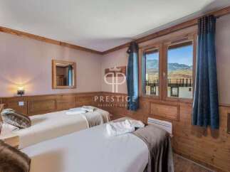 Discover a cozy bedroom with a touch of rustic charm.