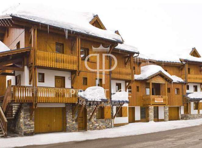 Discover the charm of this stunning wooden chalet, perfect for a winter getaway.
