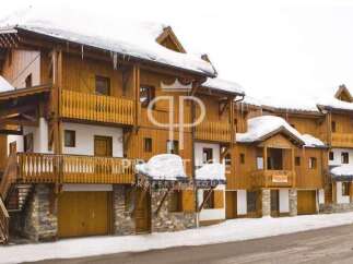 Discover the charm of this stunning wooden chalet, perfect for a winter getaway.