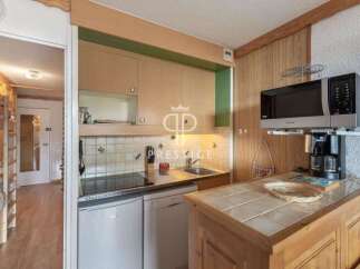 Discover this charming property featuring a well-equipped kitchen with modern appliances.
