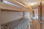 Cozy bunk beds offer a comfortable sleeping arrangement in this charming property.
