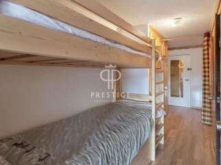 Cozy bunk beds offer a comfortable sleeping arrangement in this charming property.