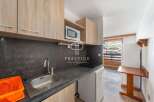 Discover a cozy kitchen space, perfect for preparing meals.