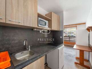 Discover a cozy kitchen space, perfect for preparing meals.