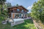 Discover a stunning chalet nestled in a picturesque setting, perfect for a luxurious getaway.