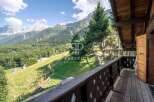 Experience breathtaking mountain views from this stunning property.
