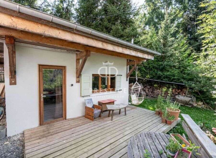 Discover a charming property nestled in a serene, natural setting.