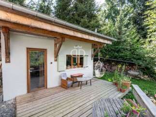 Discover a charming property nestled in a serene, natural setting.