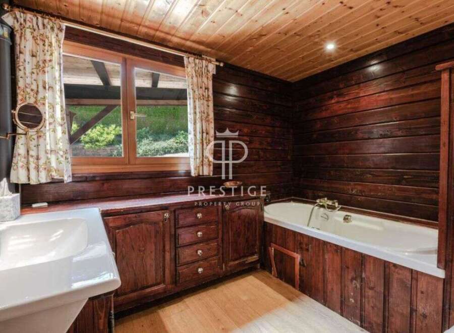 Step into rustic elegance with this charming bathroom.