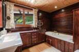 Step into rustic elegance with this charming bathroom.