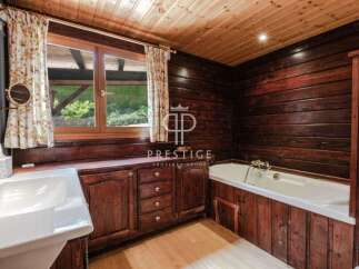 Step into rustic elegance with this charming bathroom.