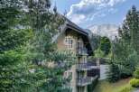 Discover a stunning property nestled amidst breathtaking mountain views.