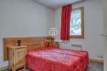 Discover a cozy bedroom with a comfortable bed, perfect for a relaxing stay.