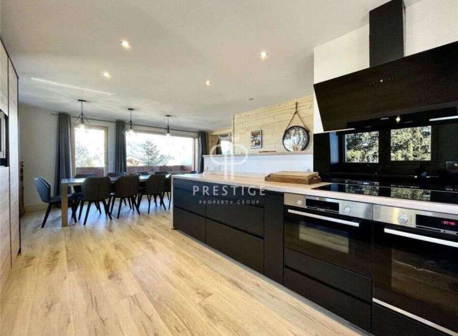 Discover modern living in this stunning property, featuring a sleek, contemporary kitchen with state-of-the-art appliances.