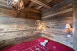 Experience rustic charm in this cozy bedroom.