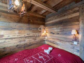 Experience rustic charm in this cozy bedroom.