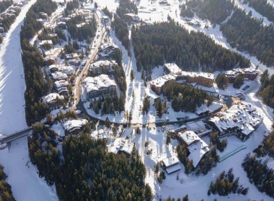 Discover a stunning winter wonderland property nestled in the heart of a picturesque ski resort.