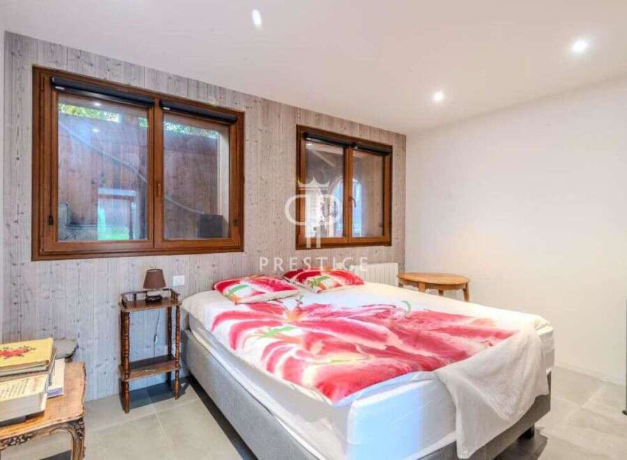 Discover a cozy bedroom with natural light streaming through the windows.