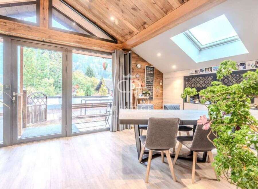 Experience the charm of this stunning property, featuring a bright and airy interior with a unique wooden ceiling.