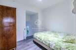 Discover this charming property featuring a cozy bedroom with a comfortable bed and fresh linens.