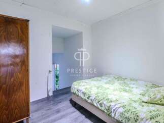 Discover this charming property featuring a cozy bedroom with a comfortable bed and fresh linens.
