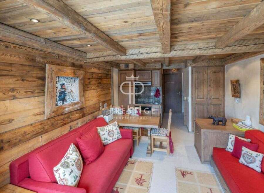 Experience rustic charm in this cozy chalet, featuring warm wooden interiors and a welcoming atmosphere.