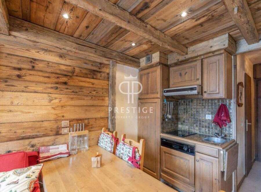 Discover rustic charm in this stunning property, featuring exquisite wooden details throughout.