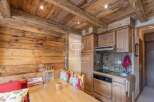 Discover rustic charm in this stunning property, featuring exquisite wooden details throughout.