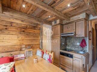 Discover rustic charm in this stunning property, featuring exquisite wooden details throughout.
