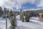 Experience the ultimate winter getaway in this stunning property nestled amidst a snowy landscape.