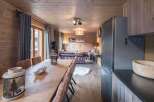 Experience rustic charm in this stunning property, featuring warm wooden interiors and a cozy ambiance.