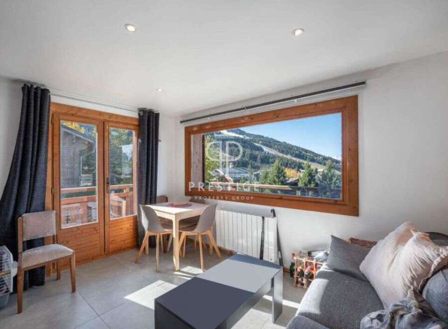 Experience breathtaking mountain views from this cozy property.