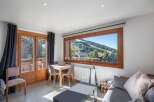 Experience breathtaking mountain views from this cozy property.