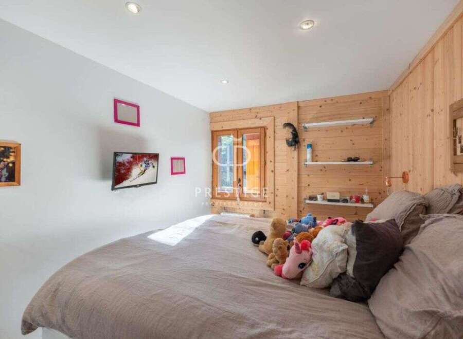 Cozy bedroom with a touch of rustic charm.
