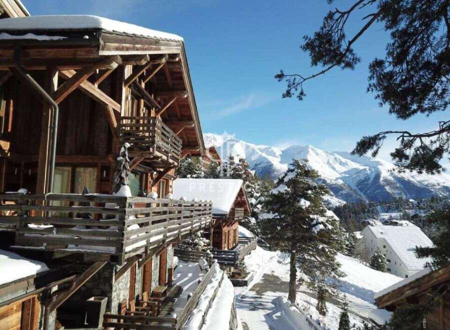 Experience the ultimate winter getaway in this stunning chalet nestled in the heart of the mountains.