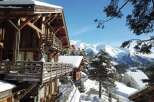 Experience the ultimate winter getaway in this stunning chalet nestled in the heart of the mountains.