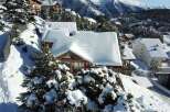 Discover a stunning mountain retreat nestled in a snowy landscape.