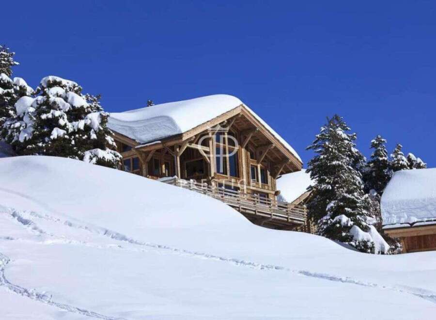 Discover a stunning chalet nestled in a winter wonderland.
