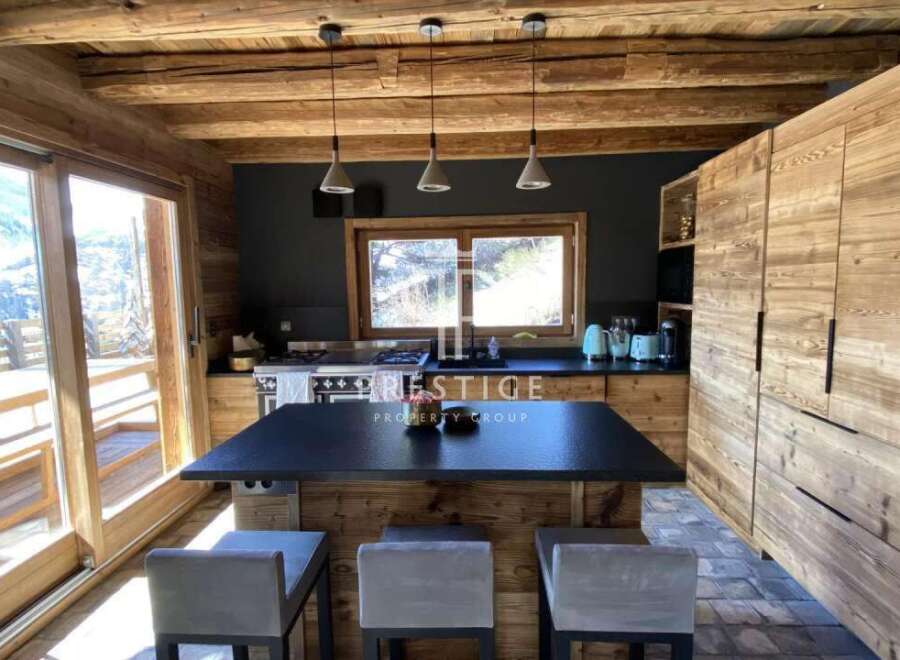 Experience rustic elegance in this stunning kitchen.