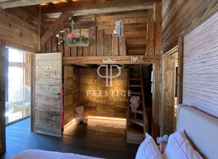 Experience rustic charm in this stunning wooden-clad property.