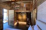 Experience rustic charm in this stunning wooden-clad property.