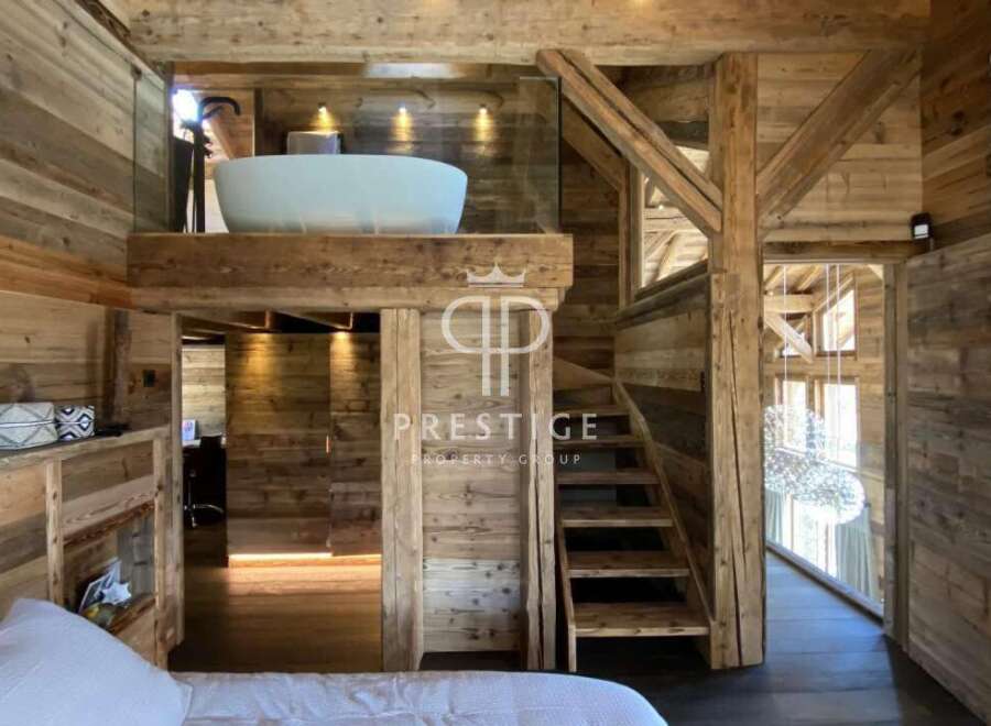 Experience rustic luxury in this stunning wooden chalet.