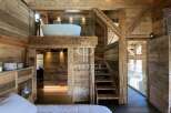 Experience rustic luxury in this stunning wooden chalet.