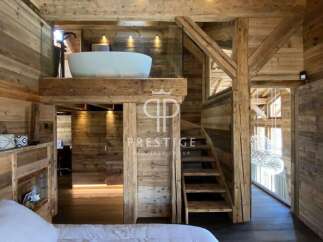 Experience rustic luxury in this stunning wooden chalet.