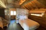 Experience rustic charm in this cozy bedroom.