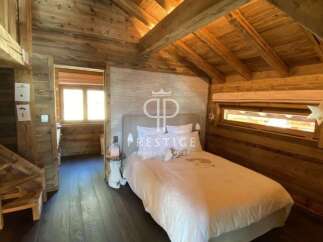 Experience rustic charm in this cozy bedroom.