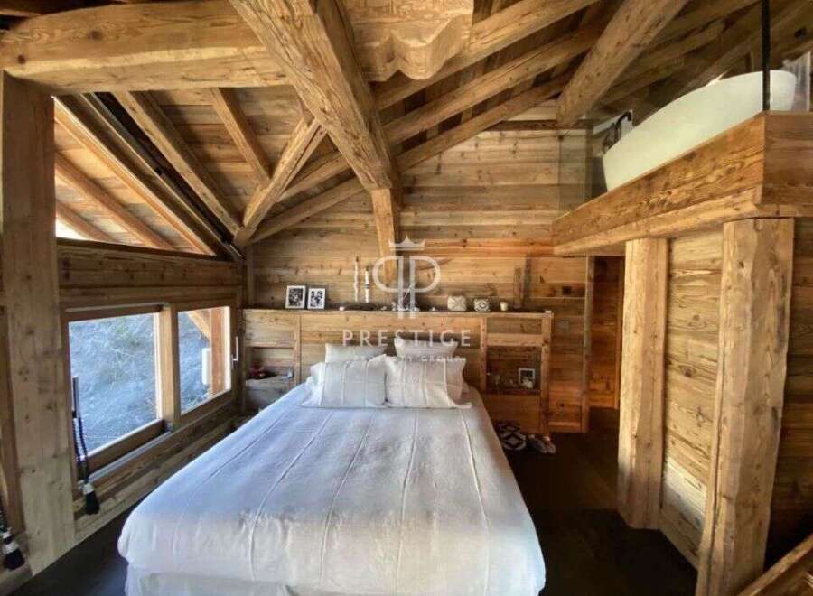 Experience rustic luxury in this stunning wooden chalet.